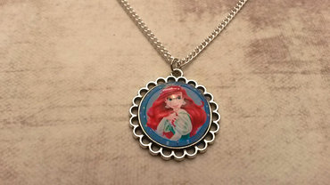 Handgemaakte kinderketting met ariel de kleine zeemeermin Handgemaakte kinderketting met ariel de kleine zeemeermin