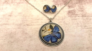 Handgemaakte ketting met blauwe vlinder Handgemaakte ketting met blauwe vlinder